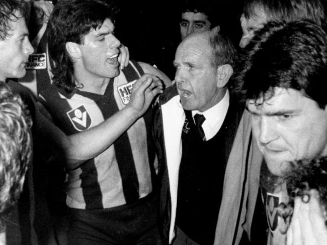 Gary Ayres helps Allan Jeans celebrate his 500th game as coach.