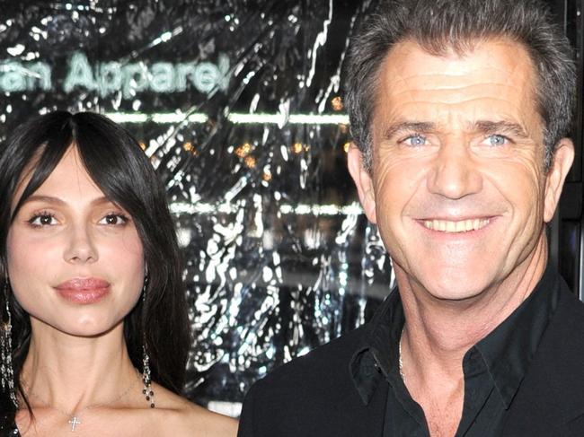 WIRE: HOLLYWOOD - JANUARY 26: Actor Mel Gibson and girlfriend Oksana Grigorieva, musician arrives at the Premiere Of Warner Bros. "The Edge Of Darkness" held at the Grauman's Chinese Theatre on January 26, 2010 in Hollywood, California. Frazer Harrison/Getty Images/AFP == FOR NEWSPAPERS, INTERNET, TELCOS & TELEVISION USE ONLY ==