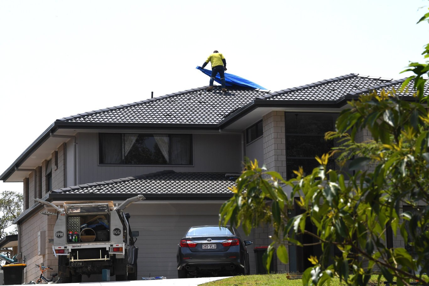 Cleaning up after the Sunday storm on the Sunshine Coast Coast. Hail damage in Palmview.