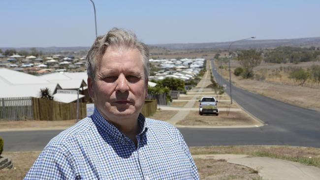 NOT HAPPY: Fernleigh development manager Geoff Kath has taken aim at the Toowoomba Regional Council's planning department, after the massive proposed Westbrook housing estate was hacked into an "unworkable" model. Fernleigh land is off to the right in the photo.