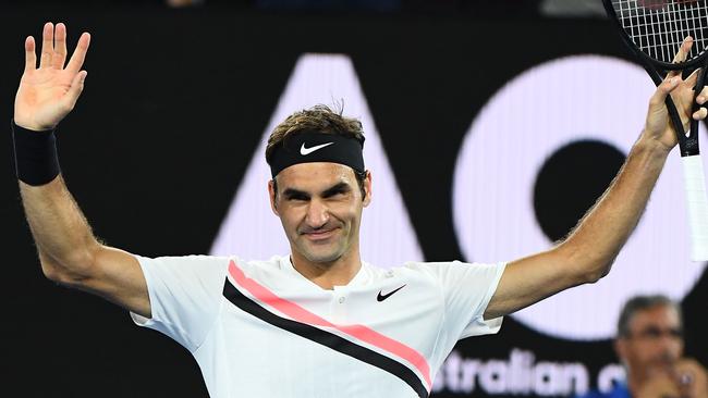 Roger Federer celebrates winning his quarter-final match against Tomas Berdych. Picture: Getty