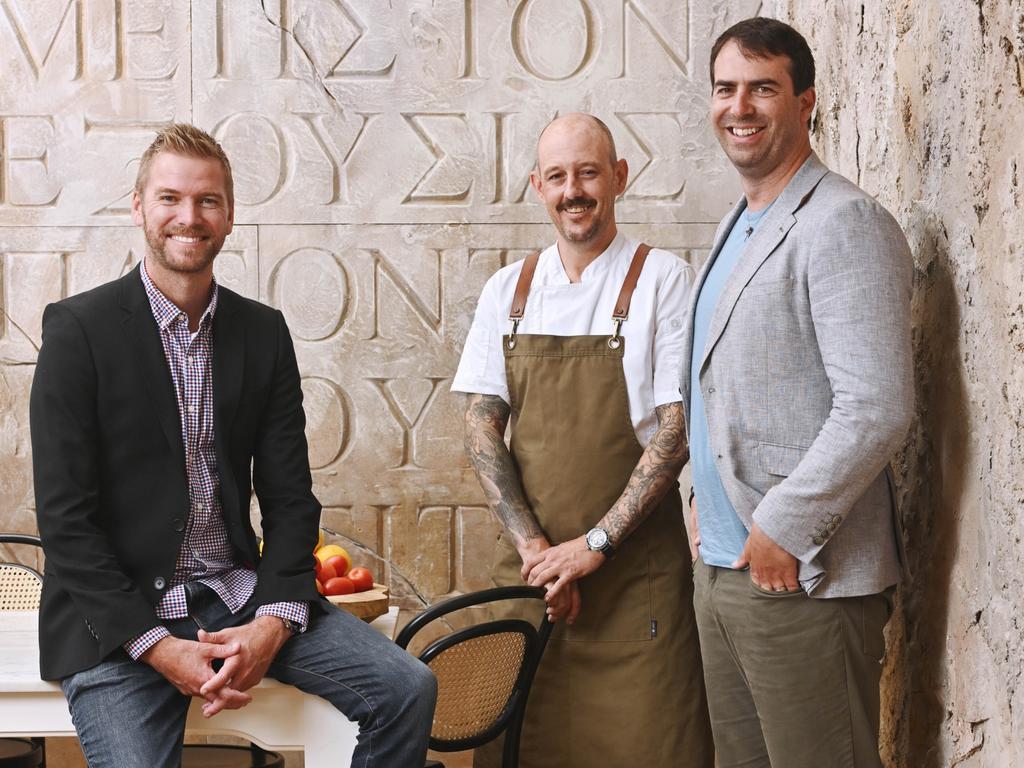 Apprentice chef Emmett McLeod with Menulog’s Morten Belling and NICI’s Nathan Lovett at Alpha. Picture: Adam Hollingworth