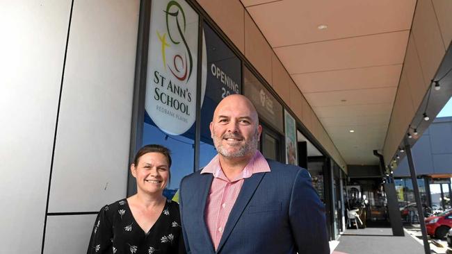 TOP JOB: Sonny Smith will be the foundation principal at St Ann's School at Redbank Plains, which opens next year. He stands alongside enrolment officer Melissa Goodingham. Picture: Rob Williams