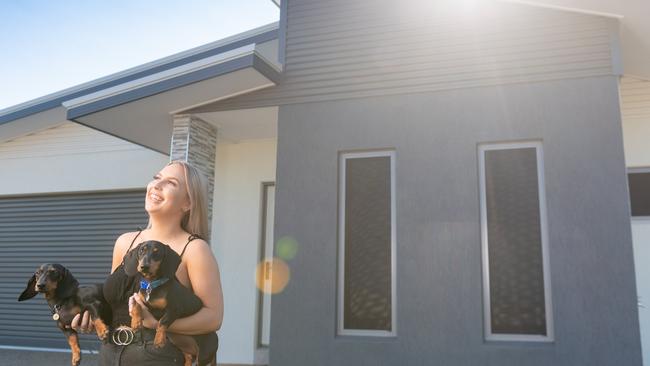 Kate Johnson was a beneficiary of the BuildBonus program, buying her first house in Zuccoli, Darwin at just 21. Picture: Che Chorley.