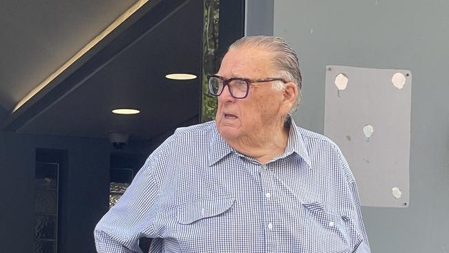 Kenneth James Grindrod, 80, leaving Wyong Local Court after pleading guilty to procuring the commission of an offence worth $90,000. Picture: NewsLocal