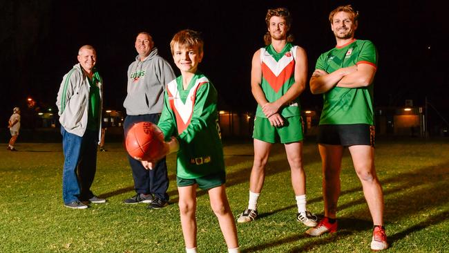 Mitchell Park B-grade coach Craig Weekly, A-g coach Ross Brokensha, Clayton Weekly, 9, Brandon Walczak and Ben Weekly. Picture: AAP/Morgan Sette.