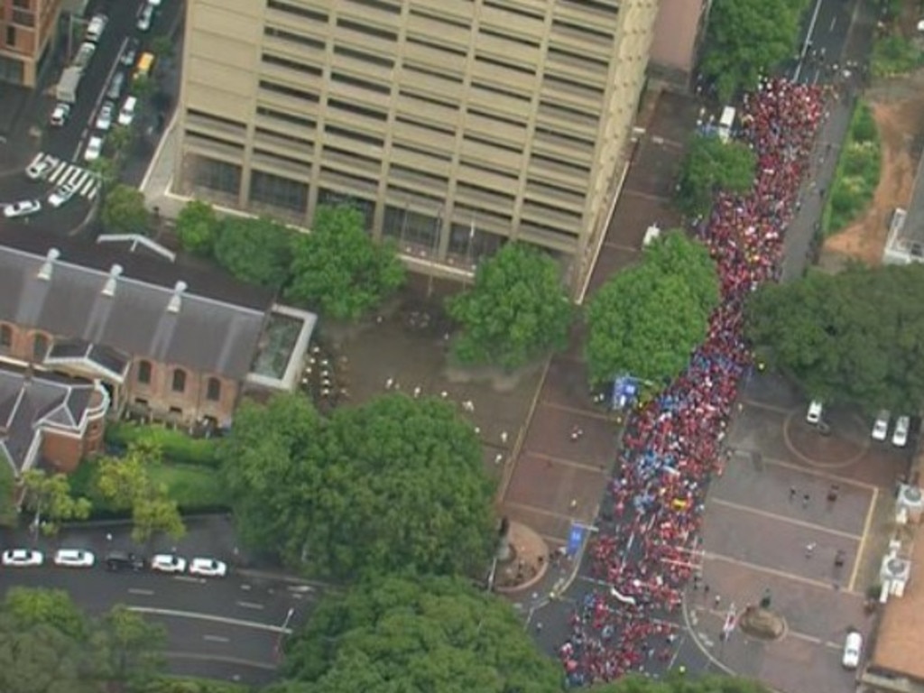 Aerial footage from a news helicopter shows the crowd marching through central Sydney. Picture: Channel 7