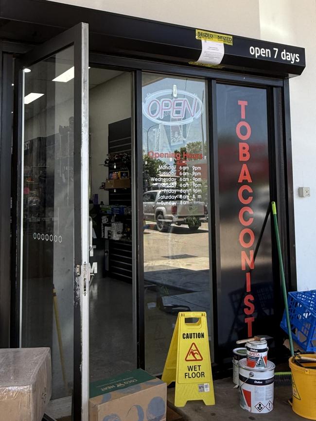 A Queensland Health closure notice taped to the front of Kirwan Tobacconist, ordering an immediate halt to the supply of smoking products. The store was shut down as part of a crackdown on illicit tobacco and vaping sales. Picture: Natasha Emeck