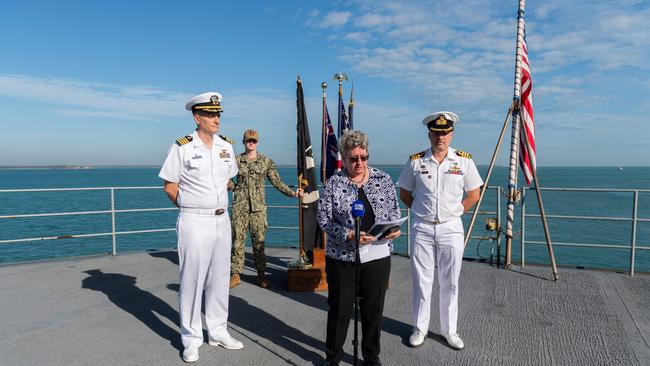 Captain Brent Spillner, US Consul General Kathleen Lively and HMAS Coonawarra Commanding Officer David Shirvington on board the USS Emory S Land. Picture: Pema Tamang Pakhrin