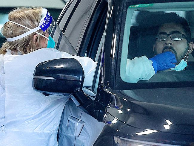 MELBOURNE, AUSTRALIA - NewsWire Photos 14 SEPTEMBER 2021 : Covid-19 cases across Melbourne's Northern and  Western suburbs are on the rise. A man gets a Covid-19 test at a site in Broadmeadows. Picture : NCA NewsWire / Ian Currie