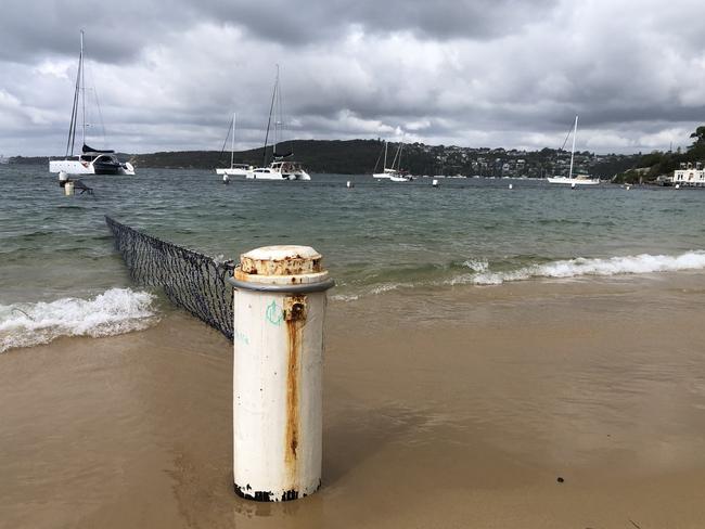 The tidal pool on West Esplanade in Manly Cove on Monday. It is a netted shark-proof enclosure, with no deck. Picture: Jim O'Rourke