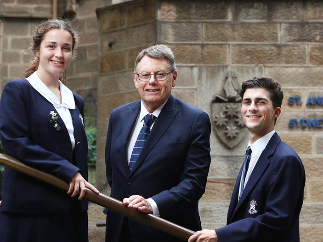 20/2/19: The head of St Andrews Cathedral School, Dr John Collier with Matthew Sgroi-Smith, 16, who has opted to study for the Higher School Certificate and Emma Askham, 17 who has opted for the globally-focused program, the  International Baccalaureate (IB), even though they are at the same school. John Feder/The Australian.