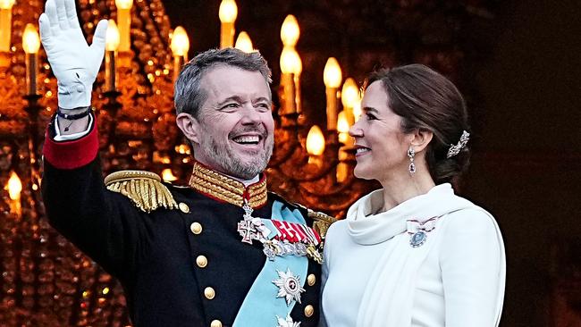 COPENHAGEN, DENMARK - JANUARY 14: King Frederik X and Queen Mary of Denmark wave from the balcony of Amalienborg after being proclaimed as King and Queen Denmark on January 14, 2024 in Copenhagen, Denmark. Her Majesty Queen Margrethe II steps down as Queen of Denmark and and entrusts the Danish throne to His Royal Highness The Crown Prince, who becomes His Majesty King Frederik X and Head of State of Denmark. (Photo by Martin Sylvest Andersen/Getty Images)