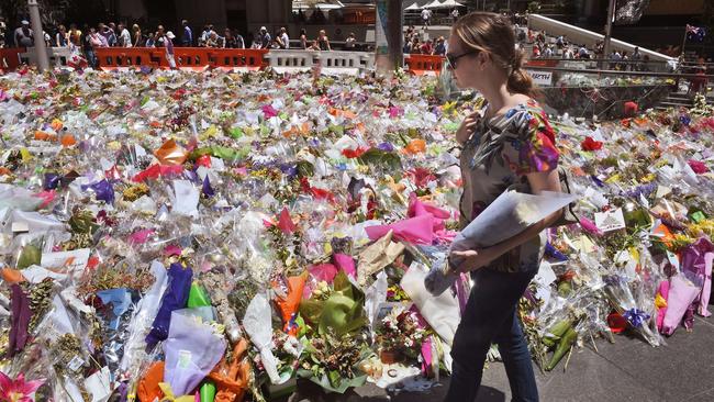 Sea of floral tributes removed from Martin Place ahead of rain | news ...