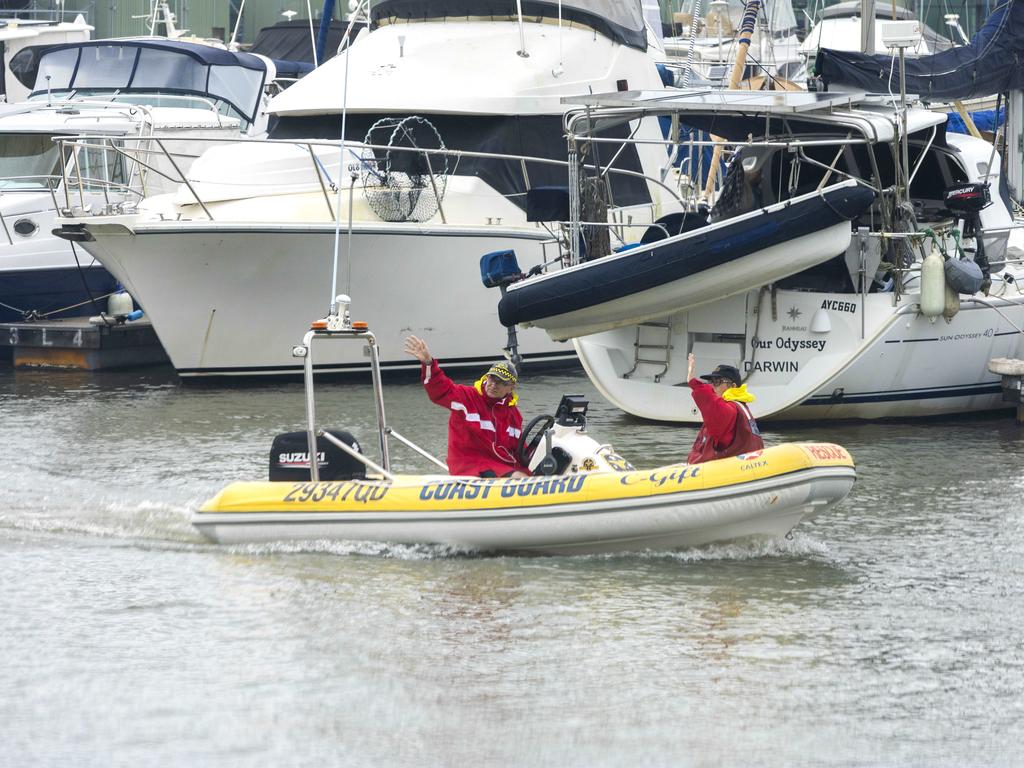 Coast Guard checking on boats in Manly Harbour. Picture: Richard Walker