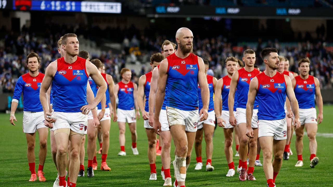 MELBOURNE, AUSTRALIA - JUNE 10: The Demons look dejected after a loss during the 2024 AFL Round 13 match between the Collingwood Magpies and the Melbourne Demons at The Melbourne Cricket Ground on June 10, 2024 in Melbourne, Australia. (Photo by Michael Willson/AFL Photos)