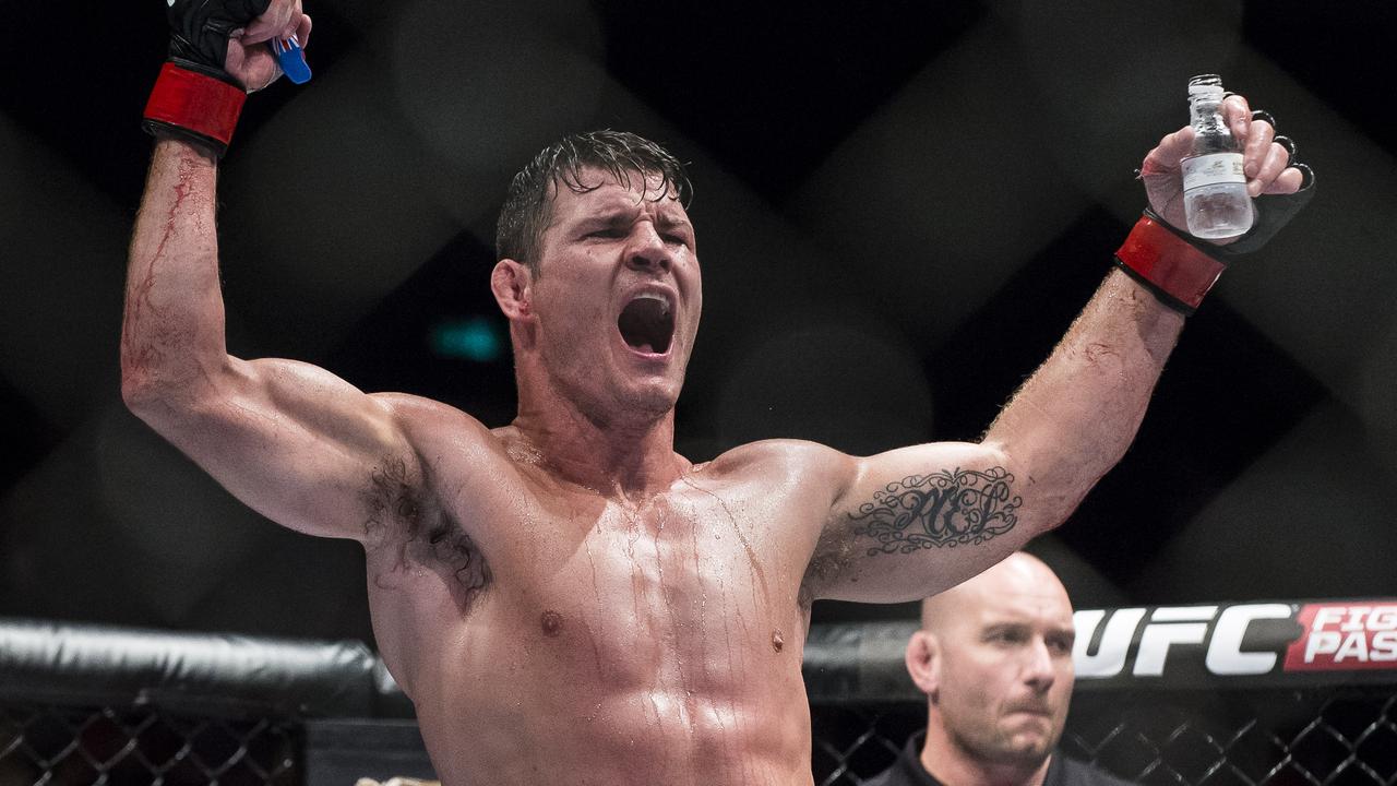 MACAU - AUGUST 23: Michael Bisping celebrates after winning his middleweight fight against Cung Le of USA during the UFC Fight Night at The Venetian Macao Cotai Arena on August 23, 2014 in Macau, China. (Photo by Victor Fraile/Getty Images) *** BESTPIX ***