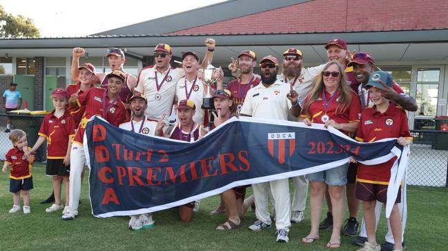 Dandenong West celebrate its second flag in as many years.