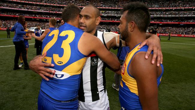 Lewis Jetta, Travis Varcoe and Willie Rioli after the siren. Picture: Michael Klein