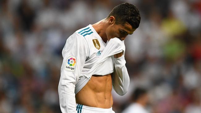 Cristiano Ronaldo reacts. / AFP PHOTO / GABRIEL BOUYS