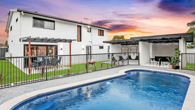 This four-bedroom, two-bathroom house at 6 Beagle Ave, Banksia Beach, is for sale for offers from $585,000.