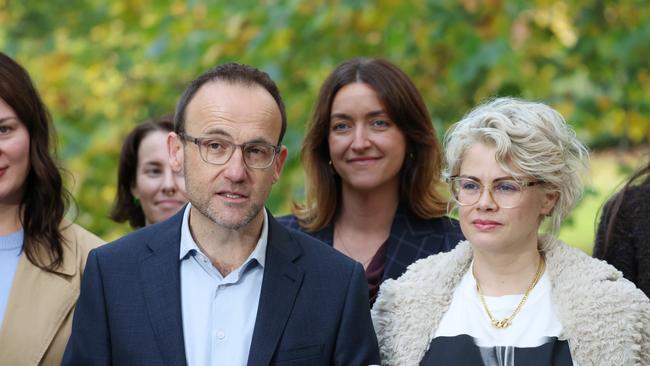 Greens leader Adam Bandt holds a press conference to concede he has lost the Federal seat of Melbourne, alongside supporters and wife Claudia. Picture: NewsWire/ David Crosling