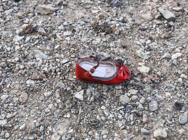 A child's shoe is pictured at the scene of a Ukrainian airliner that crashed shortly after takeoff near Imam Khomeini airport in the Iranian capital Tehran. Picture: AFP