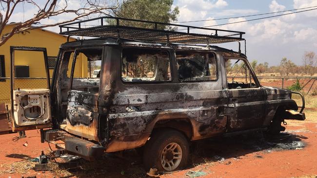 Rioters  set several vehicles alight where busy setting fires in Ali Curung during the unrest on Monday afternoon. Picture: PFES Media