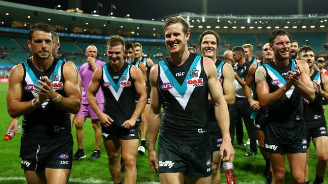 Power captain Travis Boak, left, leads Port Adelaide off the SCG after their win against Sydney on Sunday. Picture: Photo by Cameron Spencer/Getty Images