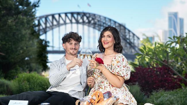 Fleur Burrows and Brehan de Gouvello enjoying a Valentine’s Day picnic prepared by North Sydney restaurant Loulou. Picture: Julian Andrews