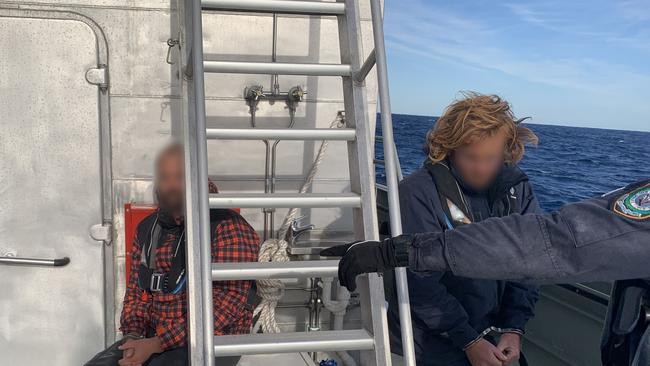 The two accused men on board the 50 foot yacht, which was intercepted early on Saturday 50 nautical miles east of Lake Macquarie. Picture: Supplied