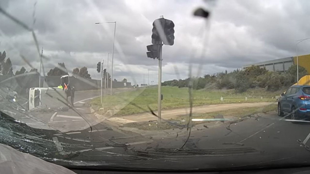 Witnesses came rushing to the aid of the van driver who pulled himself out of the van. Picture: Dashcam Owners Australia