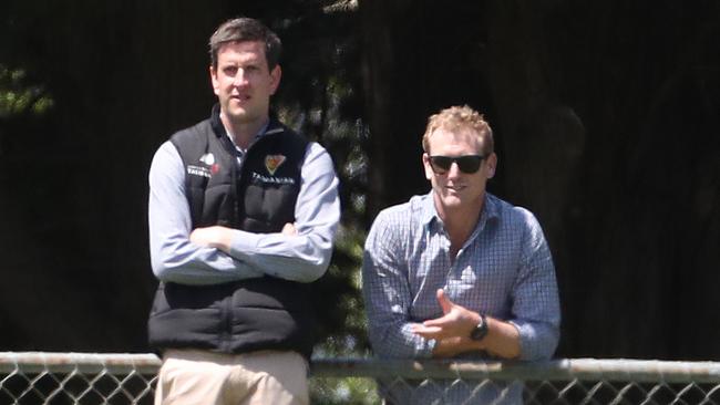 Cricket Tasmania general manager of high performance Simon Insley with former cricketer and now Cricket Australia chief selector George Bailey watch the game. Picture Nikki Davis-Jones