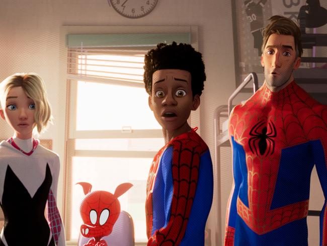 Spider-Gwen (Hailee Steinfeld), Spider-Ham (John Mulaney), Miles Morales (Shameik Moore), Peter Parker (Jake Johnson), in a scene from Spider-Man: Into the Spider-verse.