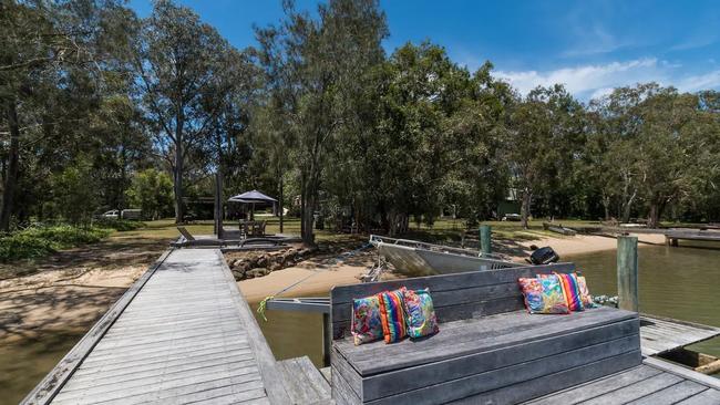 The Noosa property has a private jetty.