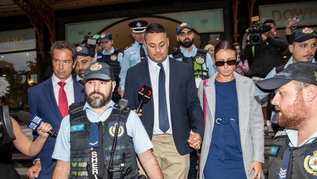 Jarryd Hayne (centre) walked from court on bail last week holding the hand of his wife Amellia Bonnici. Picture: NCA Newswire / Christian Gilles.
