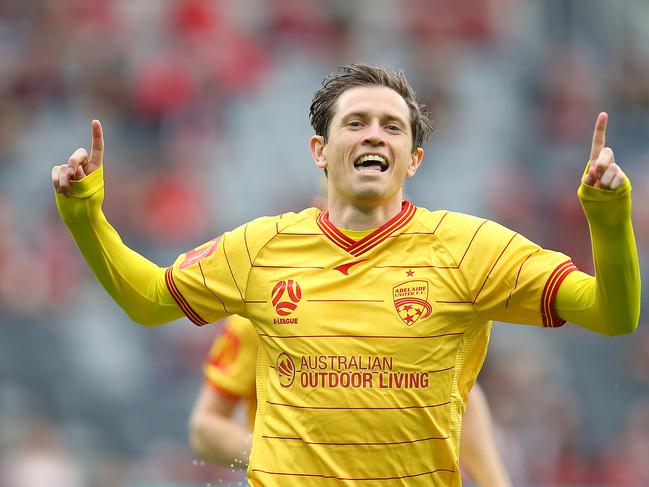 Craig Goodwin celebrates after scoring a goal. Picture: Jason McCawley/Getty Images