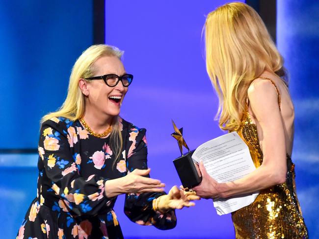 Nicole Kidman accepts her AFI Lifetime Achievement Award from her idol, Meryl Streep. Picture: Getty Images