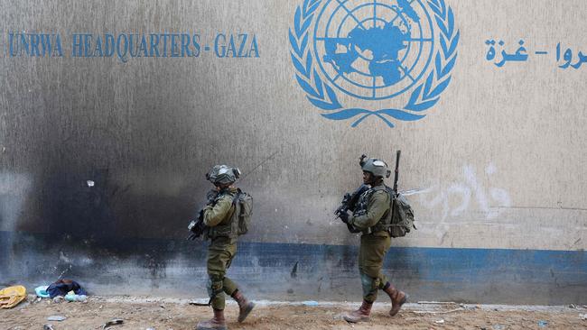 Israeli soldiers inside a compound of the United Nations Relief and Works Agency for Palestine Refugees (UNRWA) in the Gaza Strip.