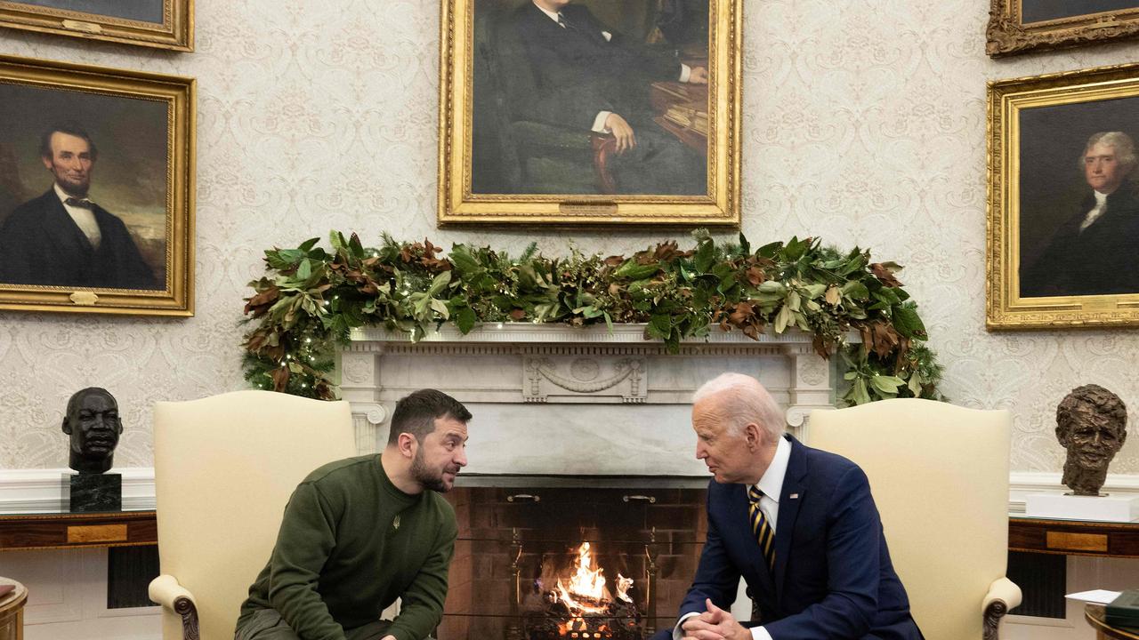 The pair chatted by the fire surrounded by the portraits of former US presidents and the famous sculpture of Martin Luther King. Picture: AFP