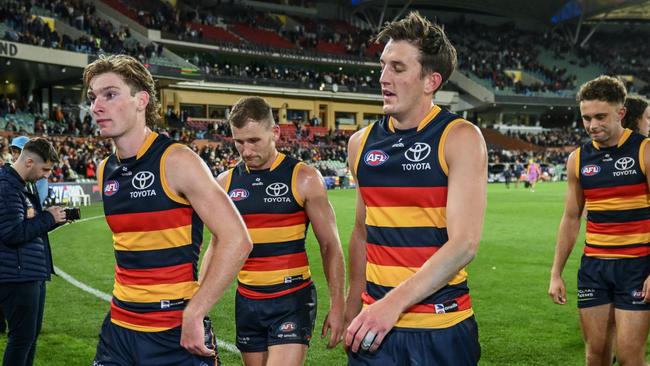 ADELAIDE, AUSTRALIA - APRIL 19: Crows head off the ground after  their loss  during the round six AFL match between Adelaide Crows and Essendon Bombers at Adelaide Oval, on April 19, 2024, in Adelaide, Australia. (Photo by Mark Brake/Getty Images)