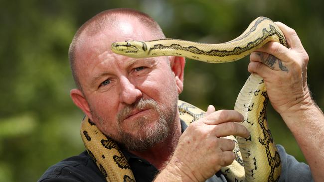 Snake catcher Tony Harrison says he was getting uo to 14 call-outs a day during the busy September and October period. Picture: Nigel Hallett