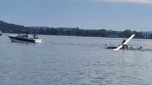 Two people have survived after a gyrocopter crashed into Lake Macquarie near Marmong Point on April 3, 2024. Picture: Carmen Wilson.