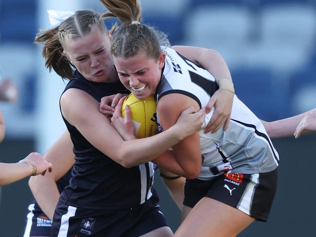 GEELONG, AUSTRALIA - MARCH 28: Meg Alsop of the Falcons and Tansy Seymour of the Rebels compete for the ball during the 2024 Coates Talent League Girls Round 1 match between the Geelong Falcons and GWV Rebels at GMHBA Stadium on March 28, 2024 in Geelong, Australia. (Photo by Rob Lawson/AFL Photos)