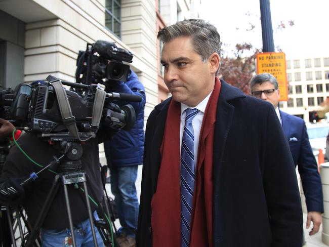 CNN's Jim Acosta walks into federal court in Washington, Wednesday, Nov. 14, 2018, to attend a hearing on a legal challenge against President Donald Trump's administration. Trump's administration contends it has 
