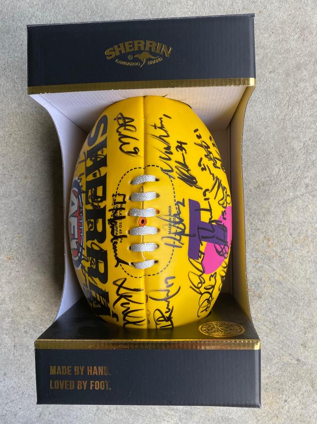 A mad Tigers supporter paid Nixon $550 last year for a footy he was told was signed by the premiership winning team.