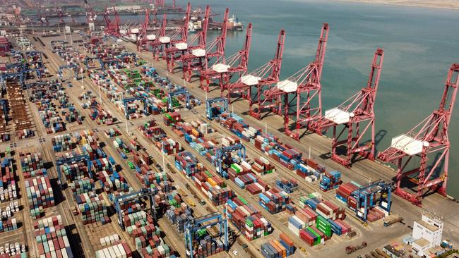 An aerial picture shows container cranes and containers at the Lianyungang Port Container Terminal in Lianyungang of Jiangsu province. Picture: AFP