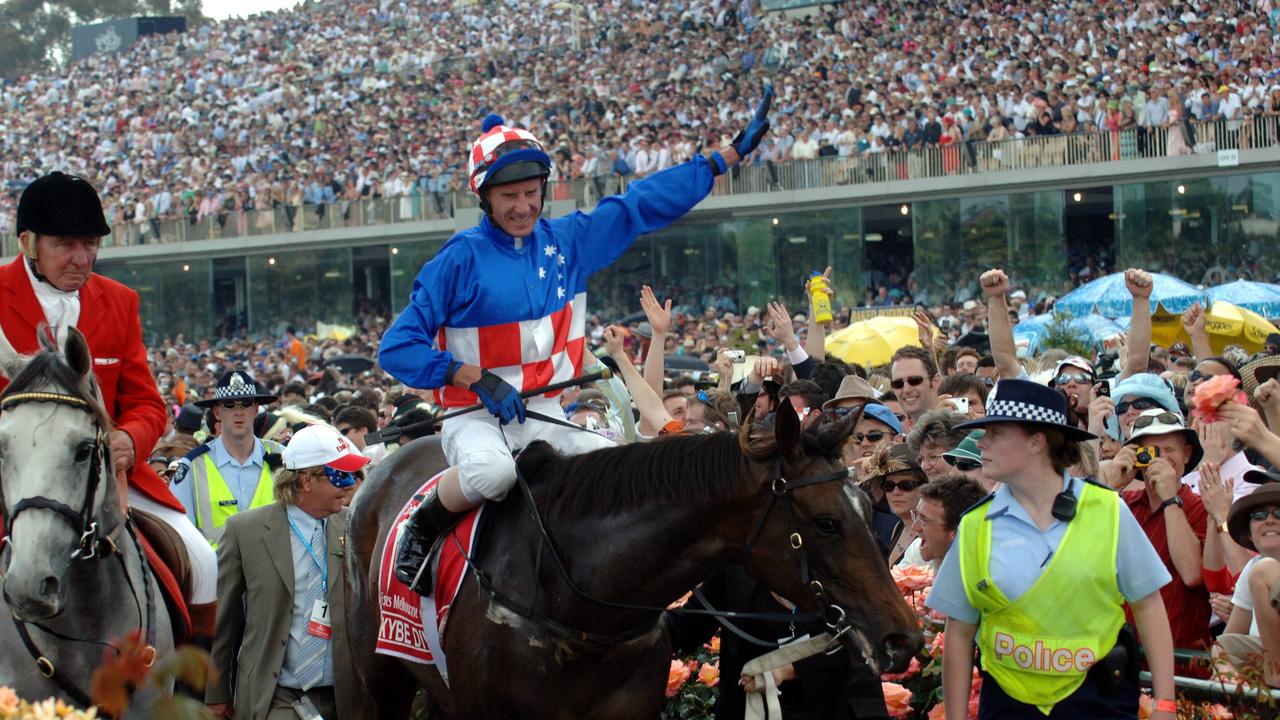 The emotion shows as Glen Boss returns to scale aboard Maykbe Diva after winning a record third 2005 Melbourne Cup.