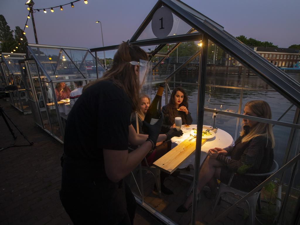 It could be the future of restaurant dining after coronavirus. Picture: AP/Peter Dejong