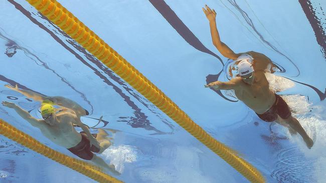 Sam Short racing against his rival Ahmed Hafnaoui of Tunisia in 2023 in Fukuoka, Japan. Short said he never set out to be a distance swimmer. Picture: Sarah Stier/Getty Images